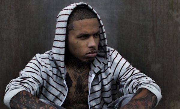 Adorable Black Kid Ink Tattoo On Neck