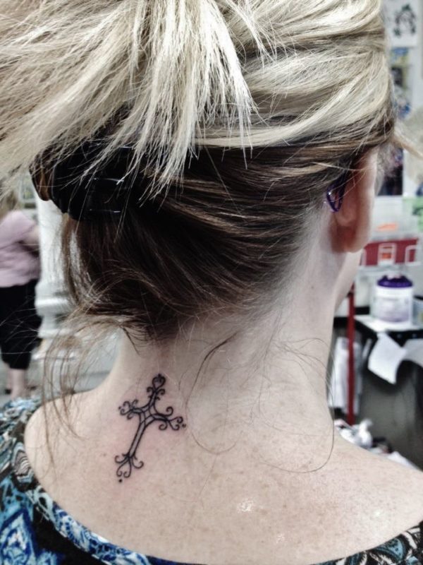 Adorable Cross Tattoo On Neck