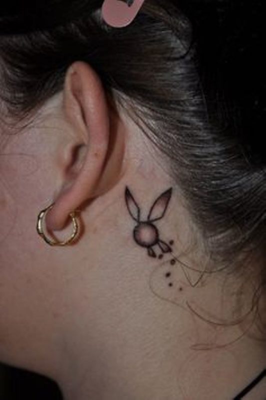 Adorable Rabbit Tattoo On Neck