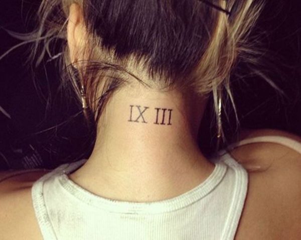 Amazing Roman Words Tattoo