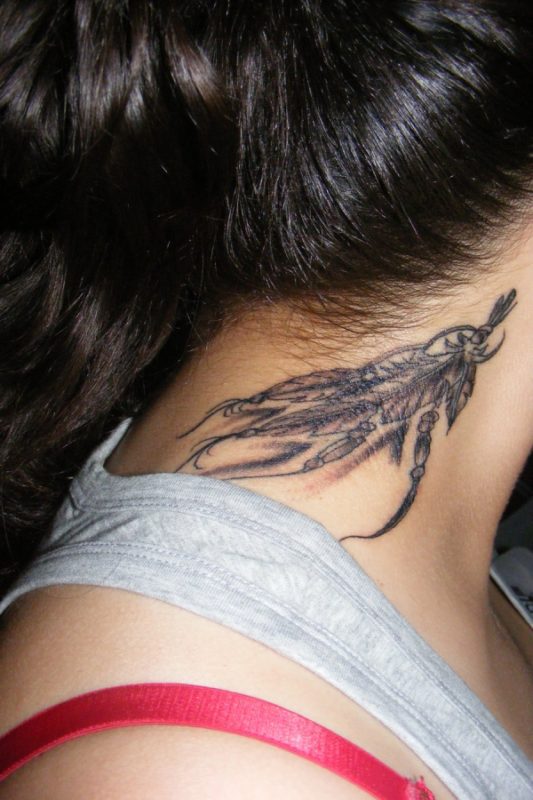 Amazing Black And Grey Feather Tattoo
