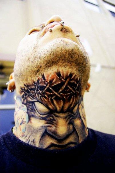 Amazing Ripped Skin Tattoo