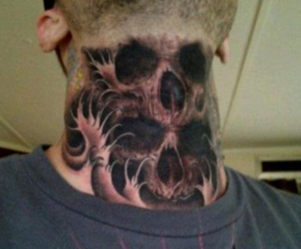 Amazing Skull Tattoo On Neck