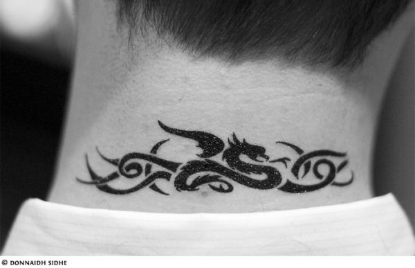 Attractive Tribal Dragon Neck Tattoo