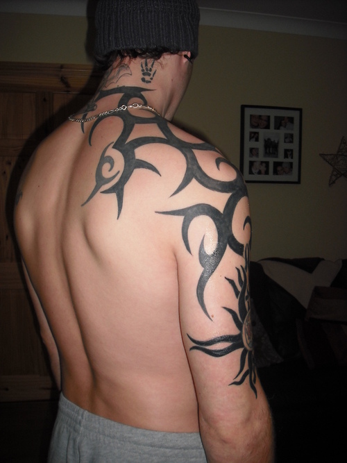 Attractive Tribal Neck Tattoo
