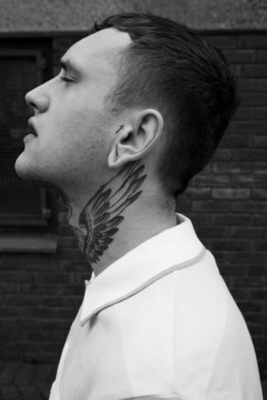 Black Eagle Tattoo On Neck