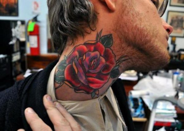 Beautiful Rose Tattoo On Right Neck