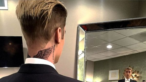 Bieber Wings Neck Tattoo