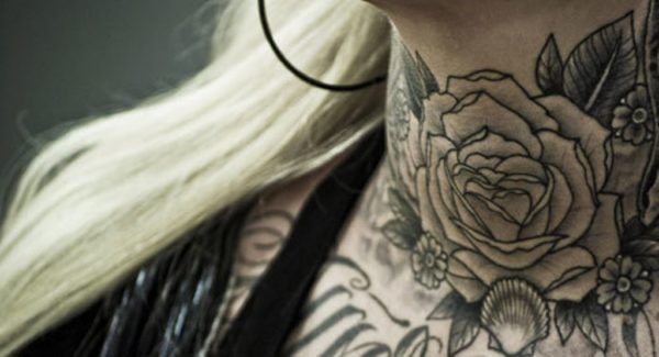 Black And Grey Flower Tattoo On Neck