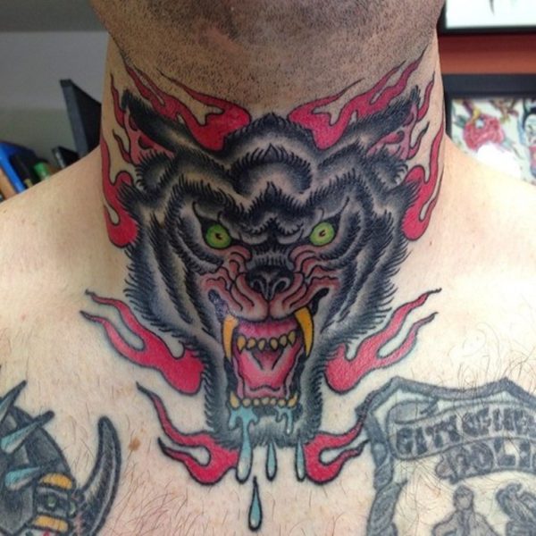 Black And Red Wolf Tattoo On Neck
