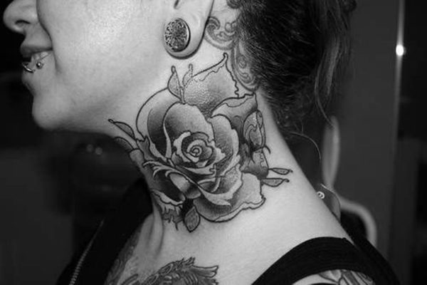 Black And White Roses Tattoo On Neck