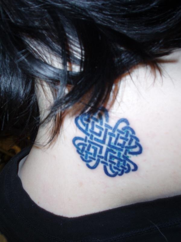 Black Celtic Tattoo On Back Neck