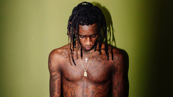Black Design Tattoo On Front Neck Young Thug