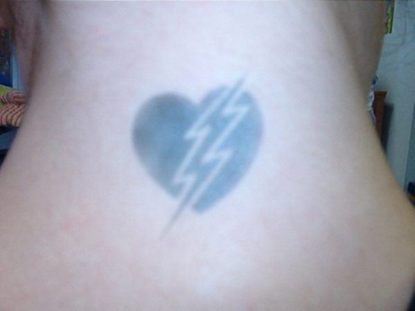Black Heart Neck Tattoo