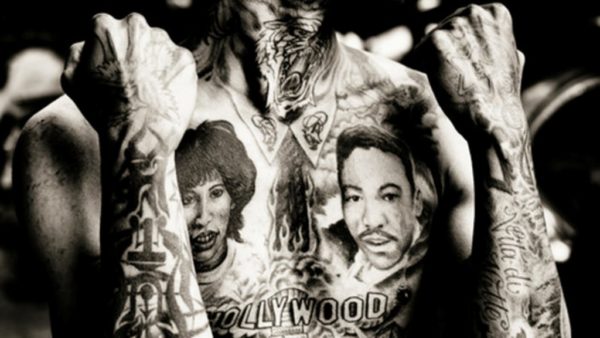 Black Kid Ink Tattoo On neck