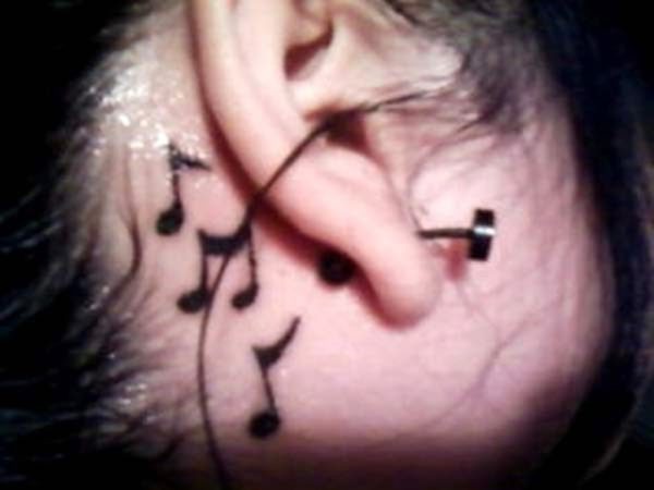 Black Music Note Tattoo On Neck