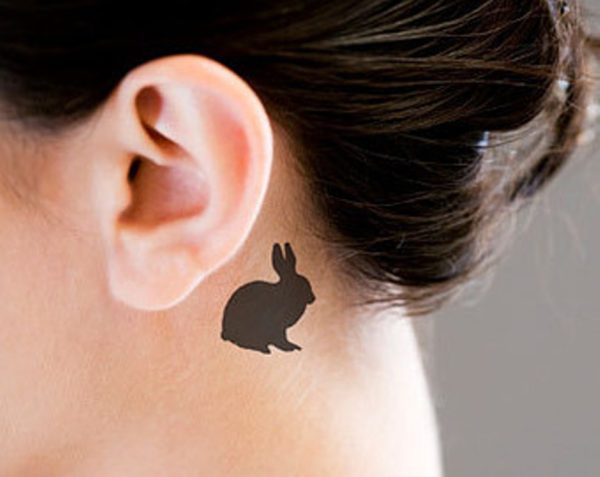 Black Rabbit Tattoo On Neck