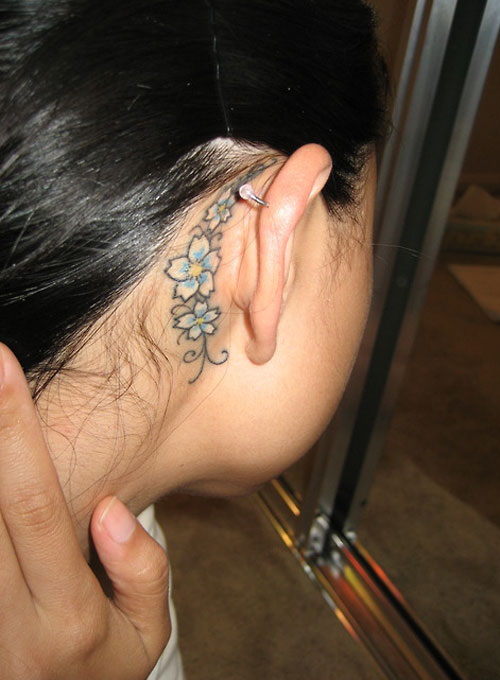 Blue Flowers Tattoo Behind Ear
