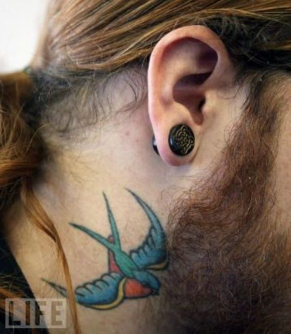 Blue Flying Bird Tattoo