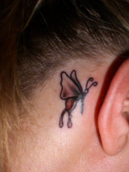 Butterfly Tribal Tattoo On Neck Behind Ears
