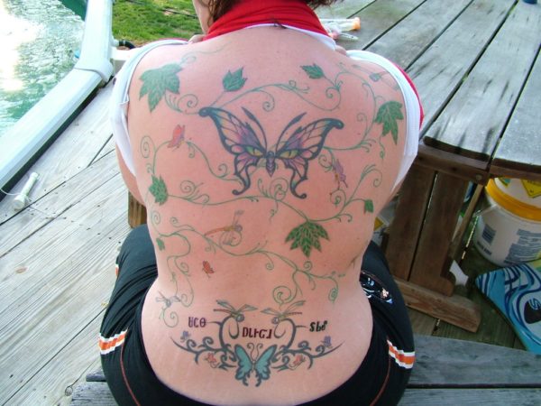 Butterfly Vine Neck Tattoo