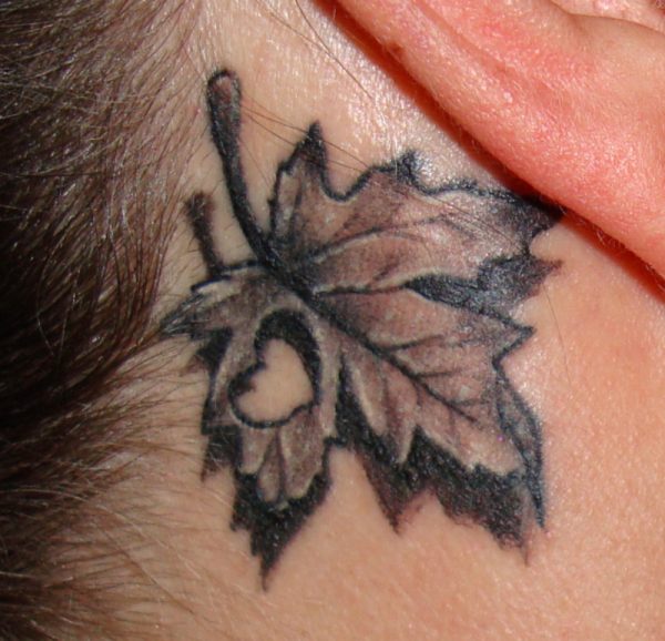 Canadian Maple Leaf Tattoo On Neck