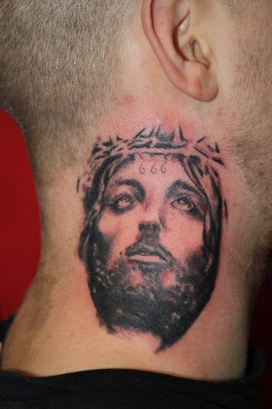 Christ Face Tattoo On Neck