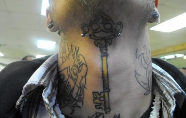 Colored Key Tattoo On Neck