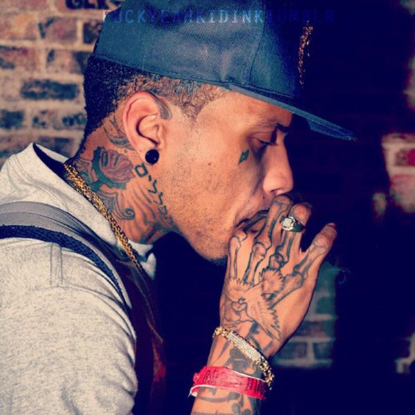 Colored Kid Ink Tattoo On Neck