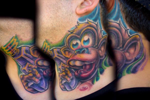 Colored Monkey Tattoo On Neck