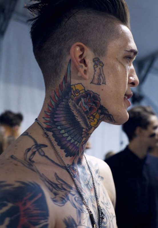 Colored Winged Tattoo On Neck