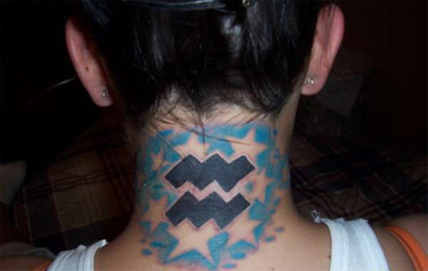 Colorful Libra Design Tattoo On Back Neck