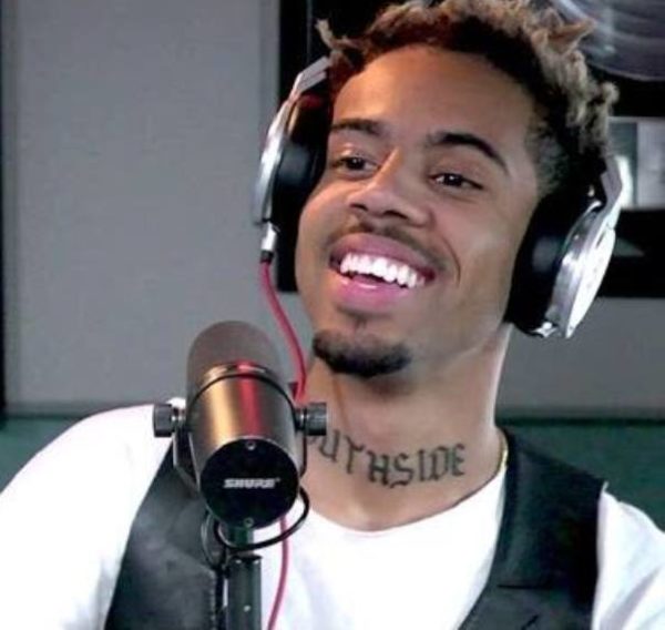 Cool Vic Mensa Tattoo On Neck