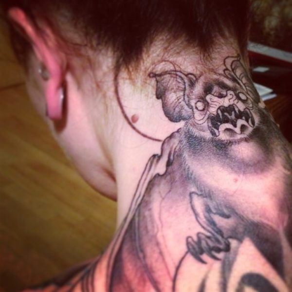 Cute Bat Tattoo On Neck