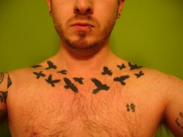 Cute Black Flying Birds Tattoo