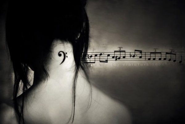 Cute Music Tattoo On Neck