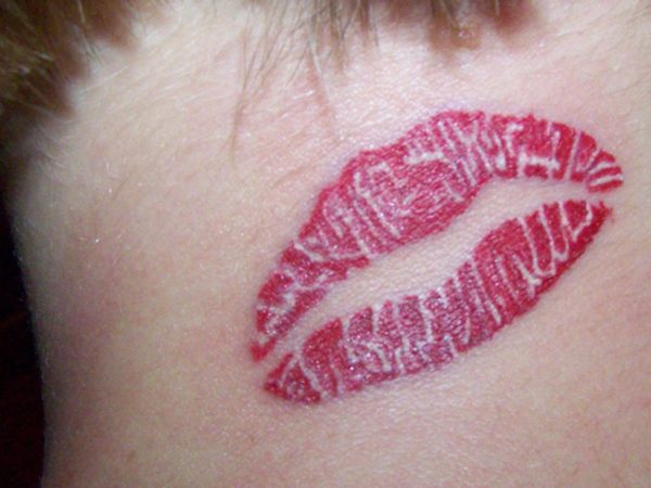 Designer Kiss Tattoo On Neck