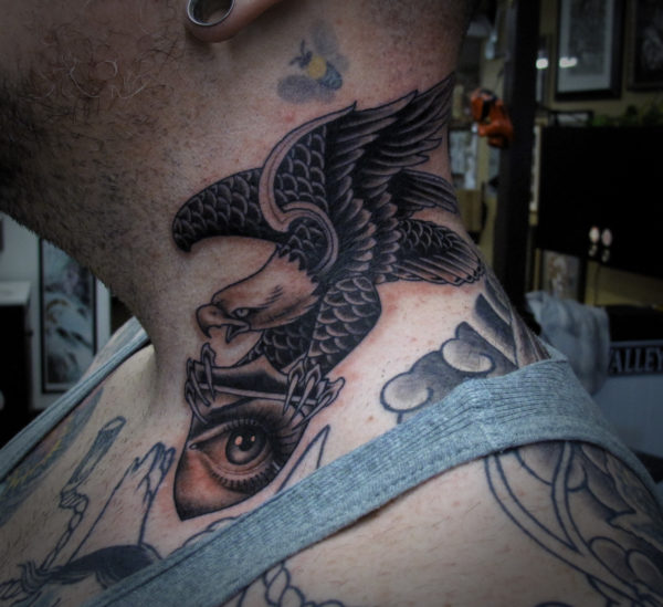 Eagle Holding Eye Tattoo On Neck