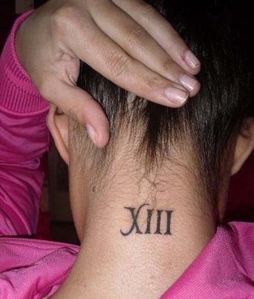 Elegant  Roman Numeral Tattoo