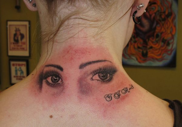 Evil Eyes Tattoo On Neck