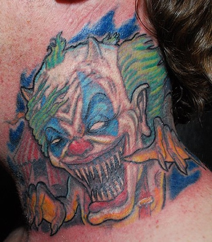 Evil Joker Tattoo On Neck