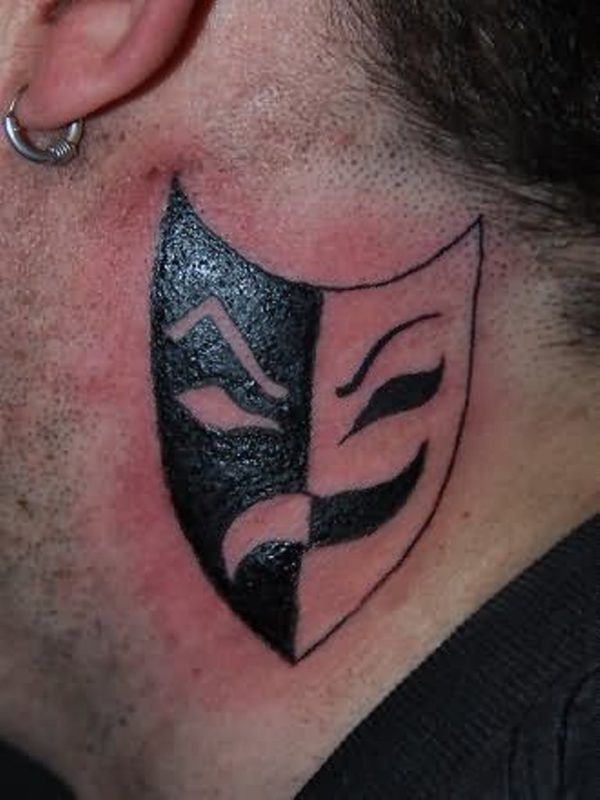 Evil Mask Tattoo On Neck