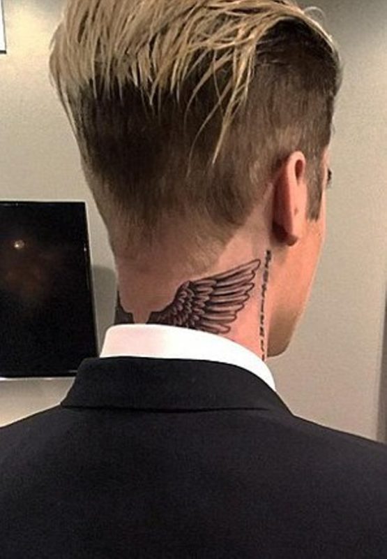Feather Bieber Tattoo On Neck