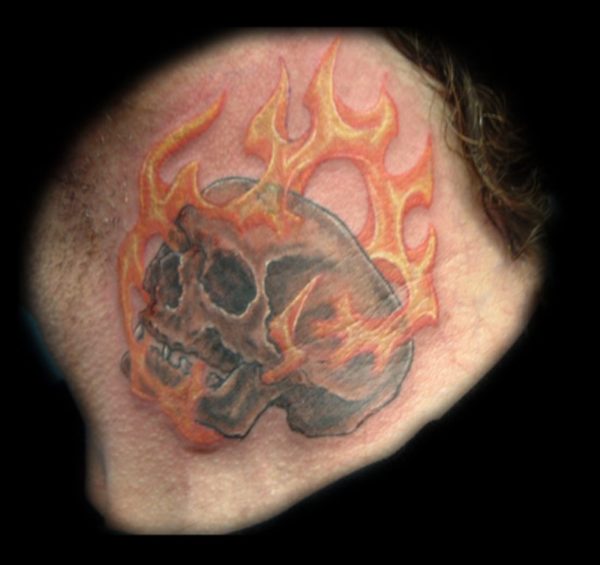 Flaming Skull Neck Tattoo