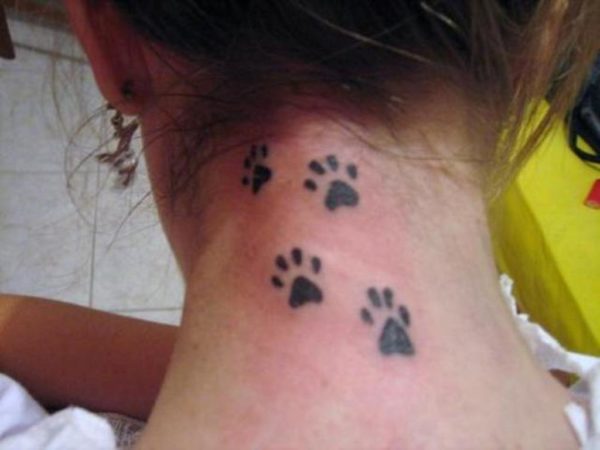 Four Paw Print Tattoo On Wrist