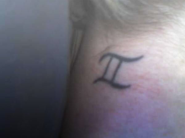 Gemini Tattoo On Back Neck