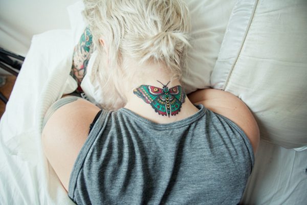 Green Butterfly Tattoo On Neck