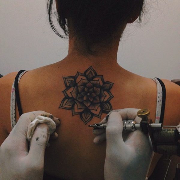 Grey Inked Lotus Tattoo On Neck