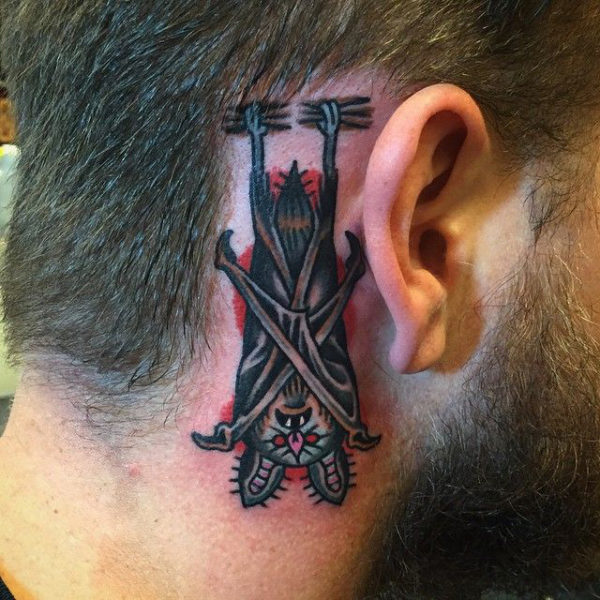 Hanging Bat Tattoo On Neck Behind Ear