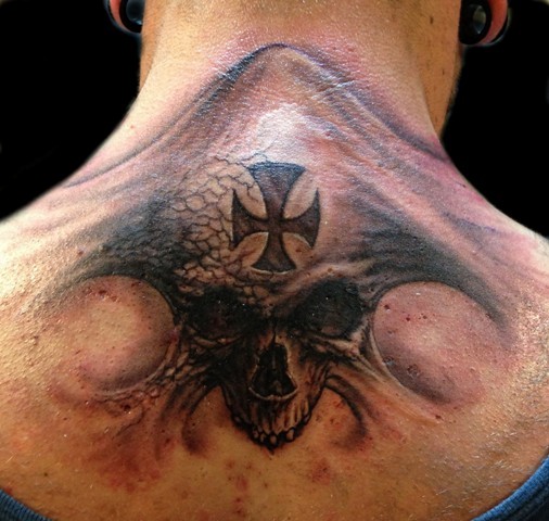 Impressive Skull Neck Tattoo Design